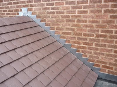 Lead flashing repair on a Orpington roof